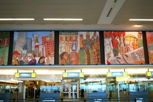 Image is taken with permission from Williamsburg-based artist Deborah Masters. This work can be found above the Immigration Hall in JFK International Airport, Terminal 4. 